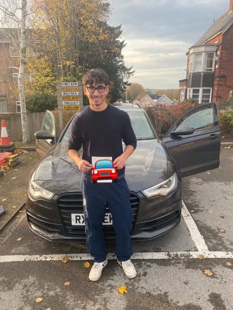 Charlie celebrating passing their driving test with Learn with Louise