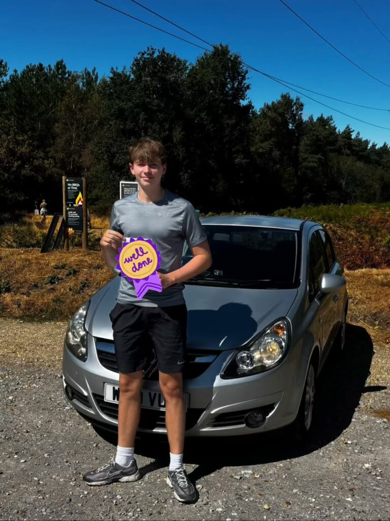 Noah celebrating passing their driving test with Learn with Louise